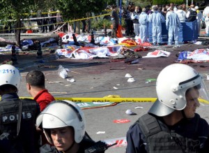 ATTENTION EDITORS - VISUAL COVERAGE OF SCENES OF INJURY OR DEATHPolice forensic experts examine the scene following explosions during a peace march in Ankara, Turkey, October 10, 2015. At least 30 people were killed when twin explosions hit a rally of hundreds of pro-Kurdish and leftist activists outside Ankara's main train station on Saturday in what the government described as a terrorist attack, weeks ahead of an election. REUTERS/Stringer - RTS3UFU